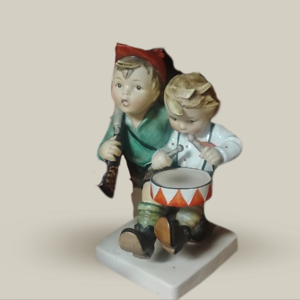 Charming Hummel Musical Figurine with Red and Green Accents